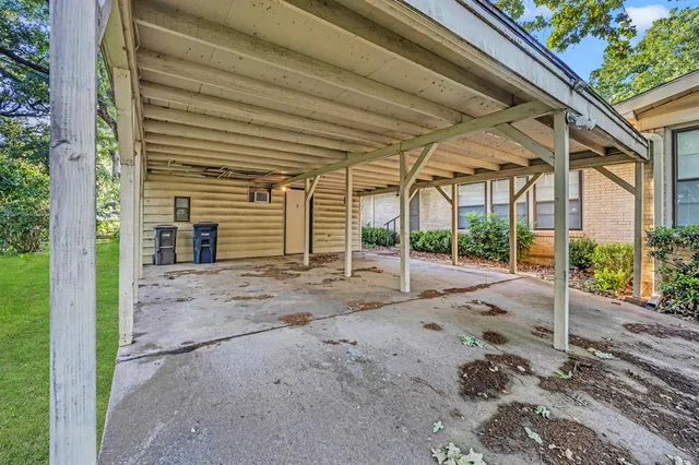 a view of a house with a street