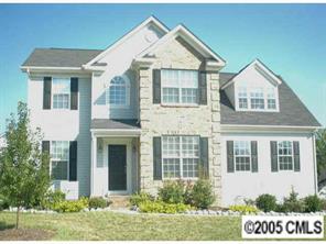 12502 Ridge Stone Court Pineville, NC 28134 - Photo 1 of 8 front view of a house and a yard