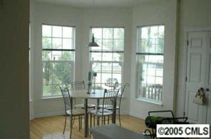 12502 Ridge Stone Court Pineville, NC 28134 - Photo 3 of 8 a dining room with furniture and window