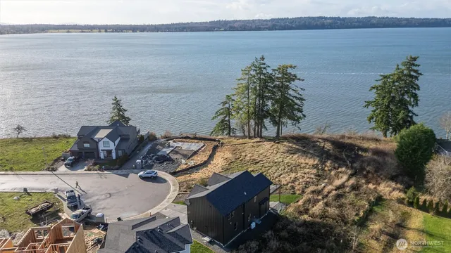 a view of a lake with a yard