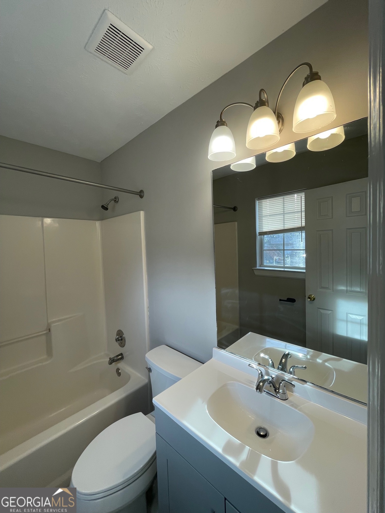 42 Pope Road Villa Rica, GA 30180 - Photo 9 of 14 a bathroom with a sink a toilet and bathtub