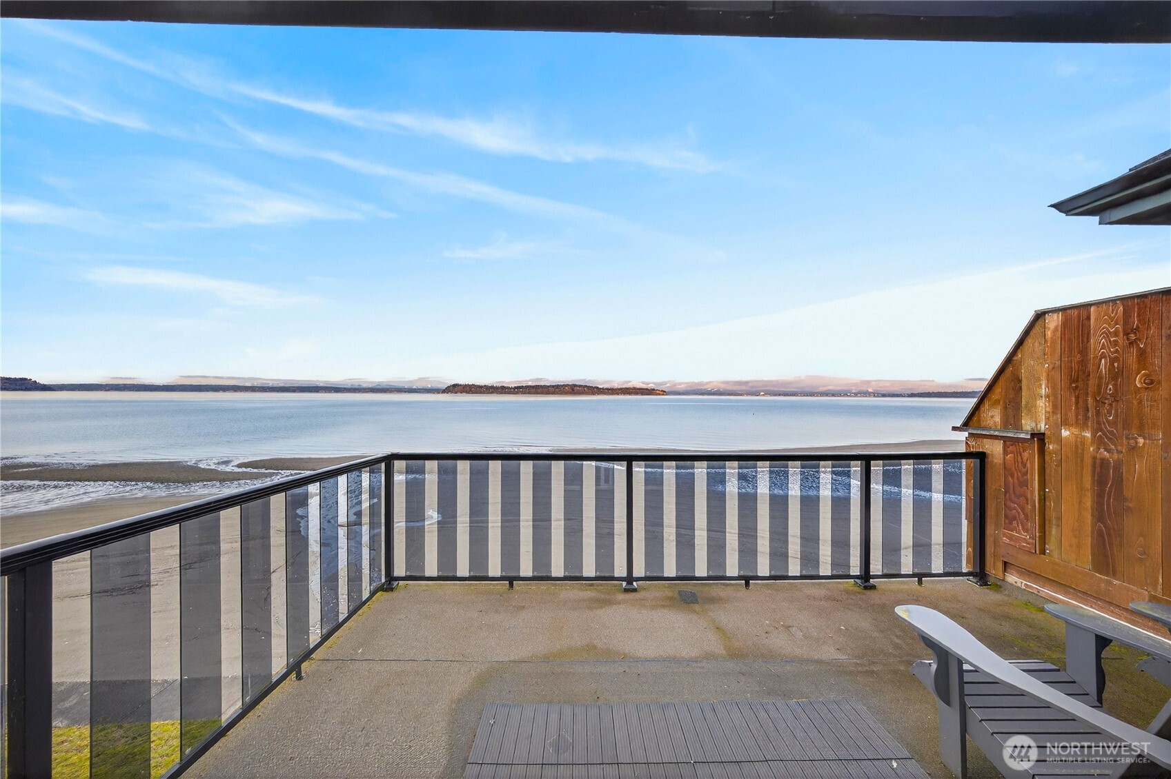 5972 Hastings Road Clinton, WA 98236 - Photo 37 of 40 a balcony with a yard