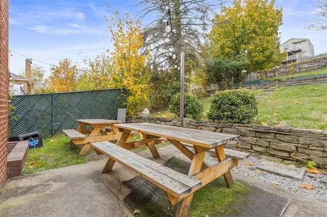 a view of a swimming pool with a lounge chairs