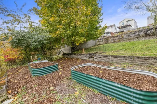 a backyard of a house with lots of green space