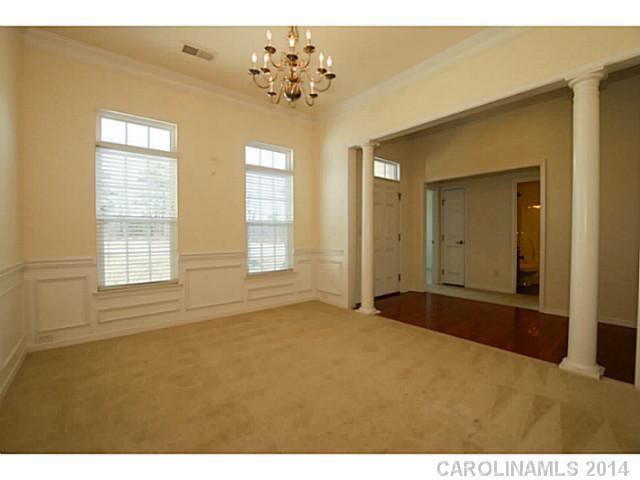 339 Calming Way Tega Cay, SC 29708 - Photo 8 of 16 a view of an empty room with a window