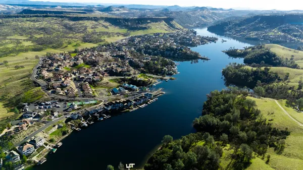 a view of a houses with a lake view