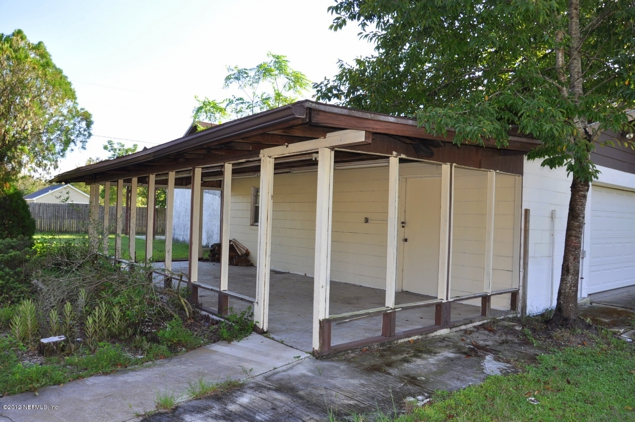 3044 Jones Road Jacksonville, FL 32220 - Photo 6 of 44 Front side of Concrete Garage