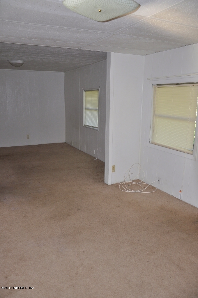3044 Jones Road Jacksonville, FL 32220 - Photo 8 of 44 Living Room and Dining Room in house