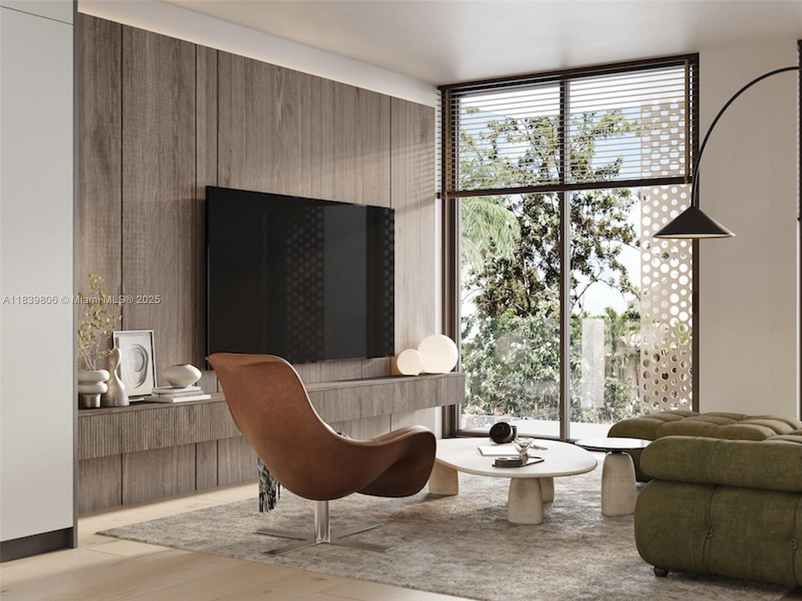 1709 Jefferson Avenue, Unit TH03 Miami Beach, FL 33139 - Photo 4 of 16 a living room with furniture and a large window