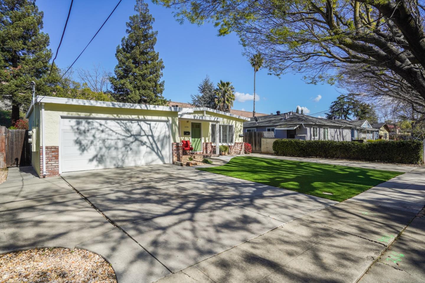 1630 Cross Way San Jose, CA 95125 - Photo 2 of 52 a view of a house with a yard and a garage