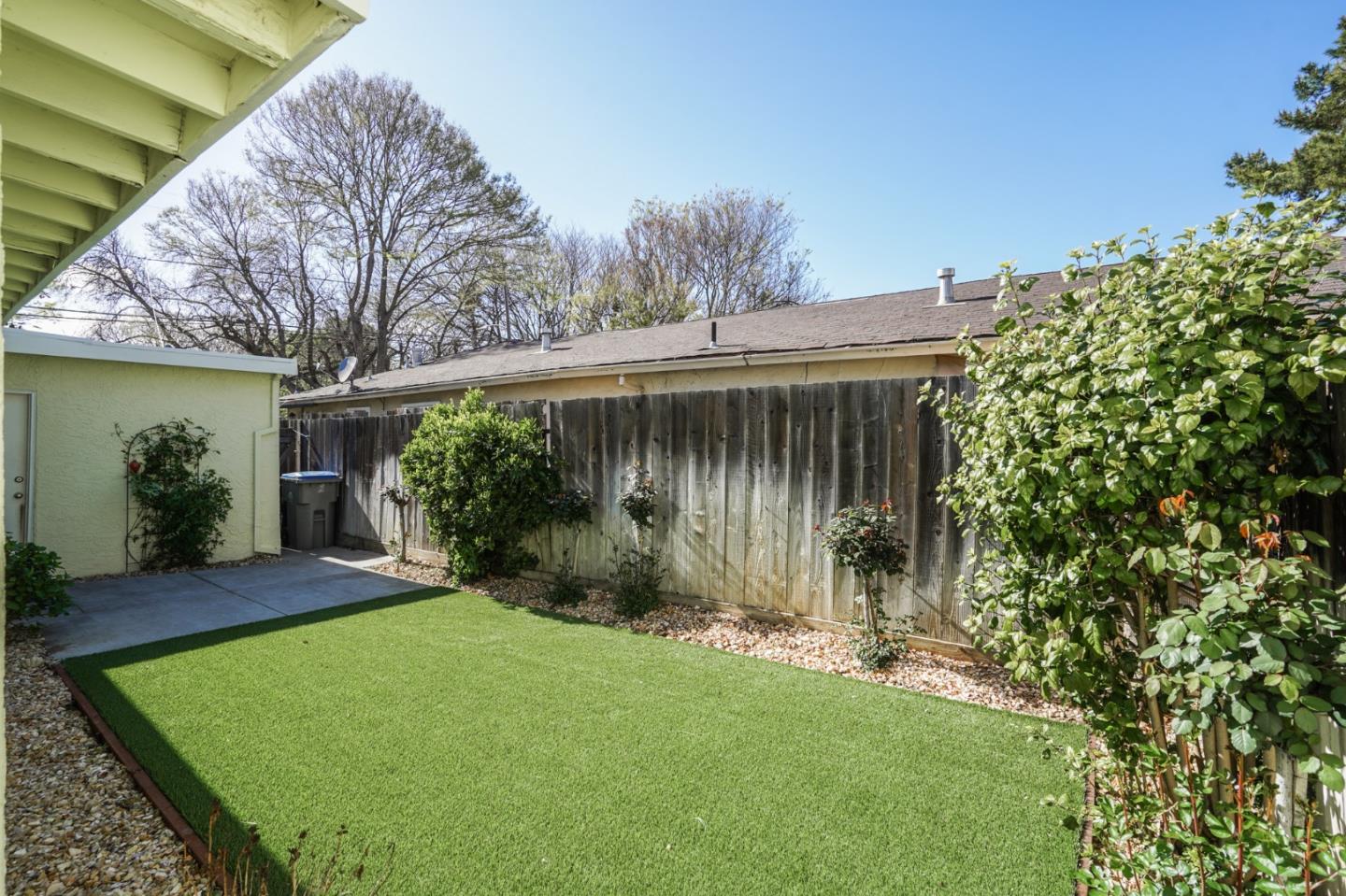 1630 Cross Way San Jose, CA 95125 - Photo 25 of 52 a backyard of a house with plants and large tree