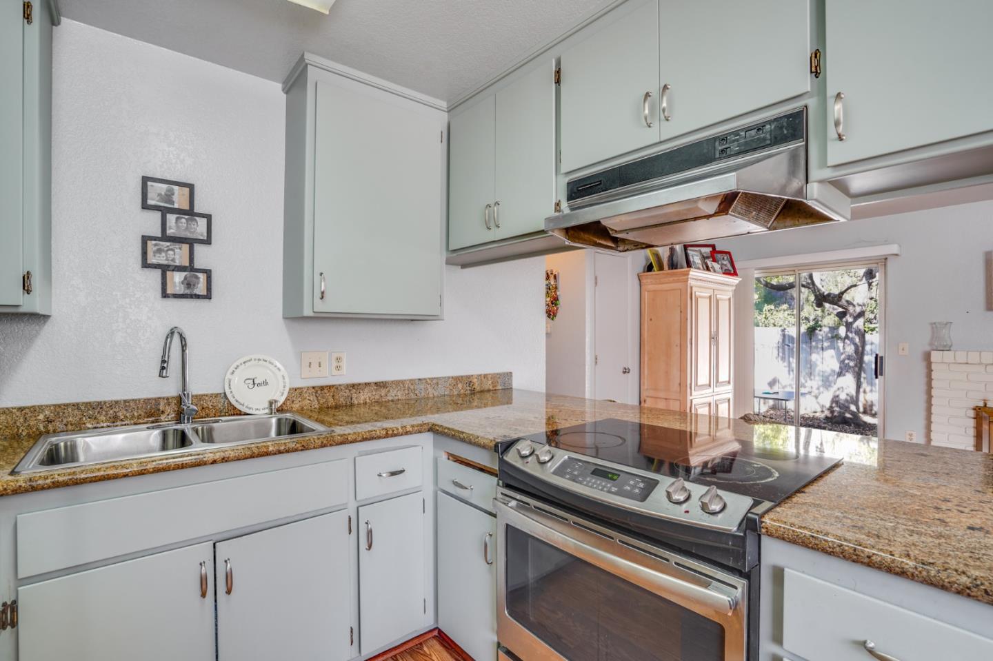 1630 Cross Way San Jose, CA 95125 - Photo 34 of 52 a kitchen with stainless steel appliances granite countertop a sink stove and cabinets