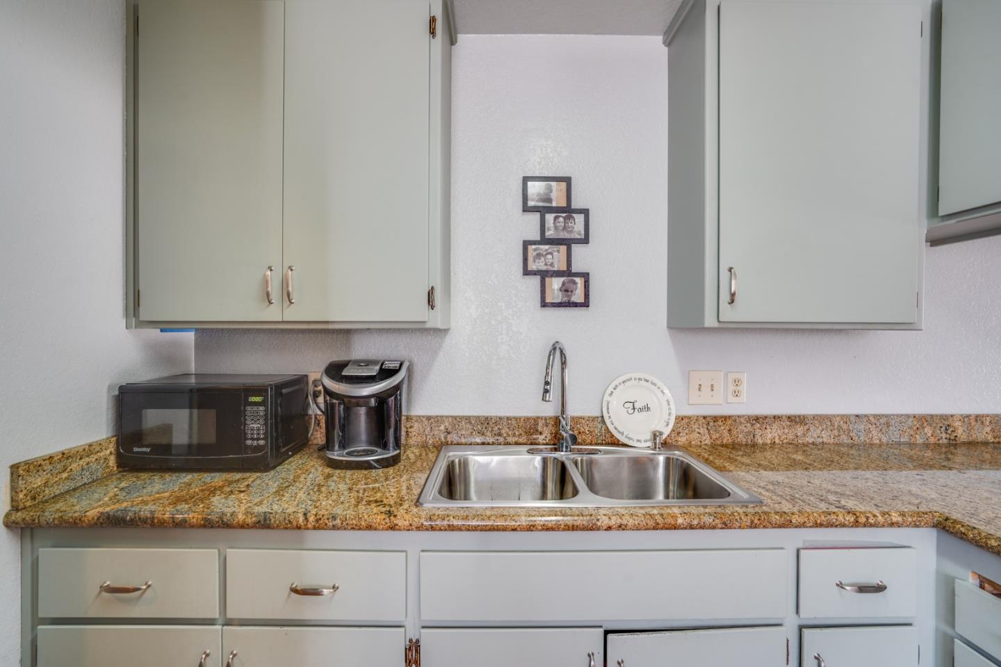 1630 Cross Way San Jose, CA 95125 - Photo 36 of 52 a kitchen with granite countertop a sink a stove and cabinets
