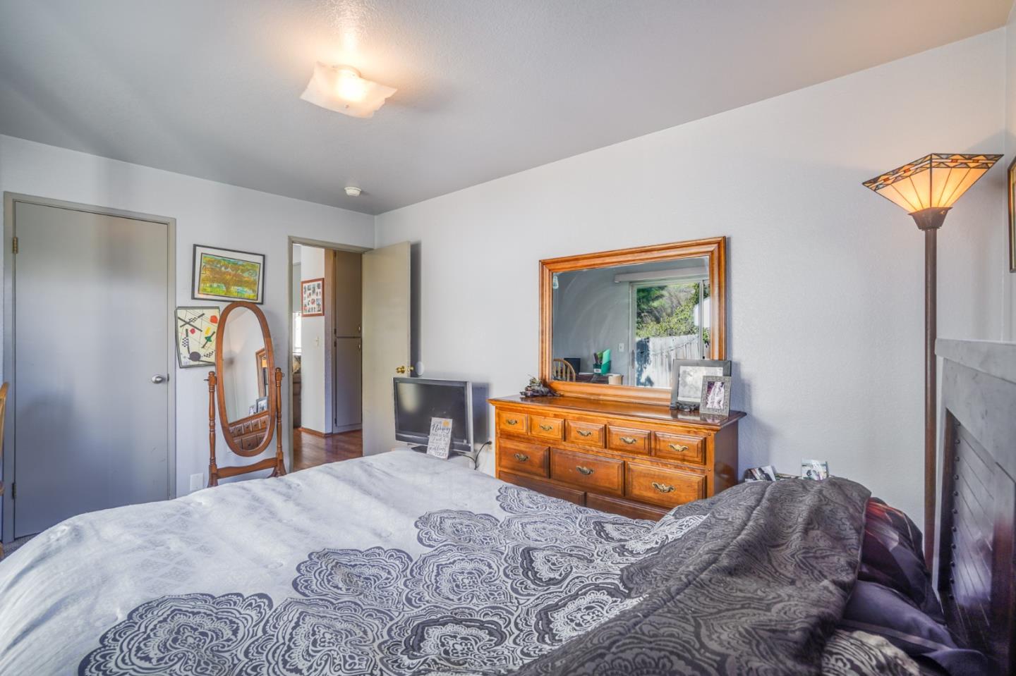 1630 Cross Way San Jose, CA 95125 - Photo 39 of 52 a bedroom with a bed and dresser with mirror