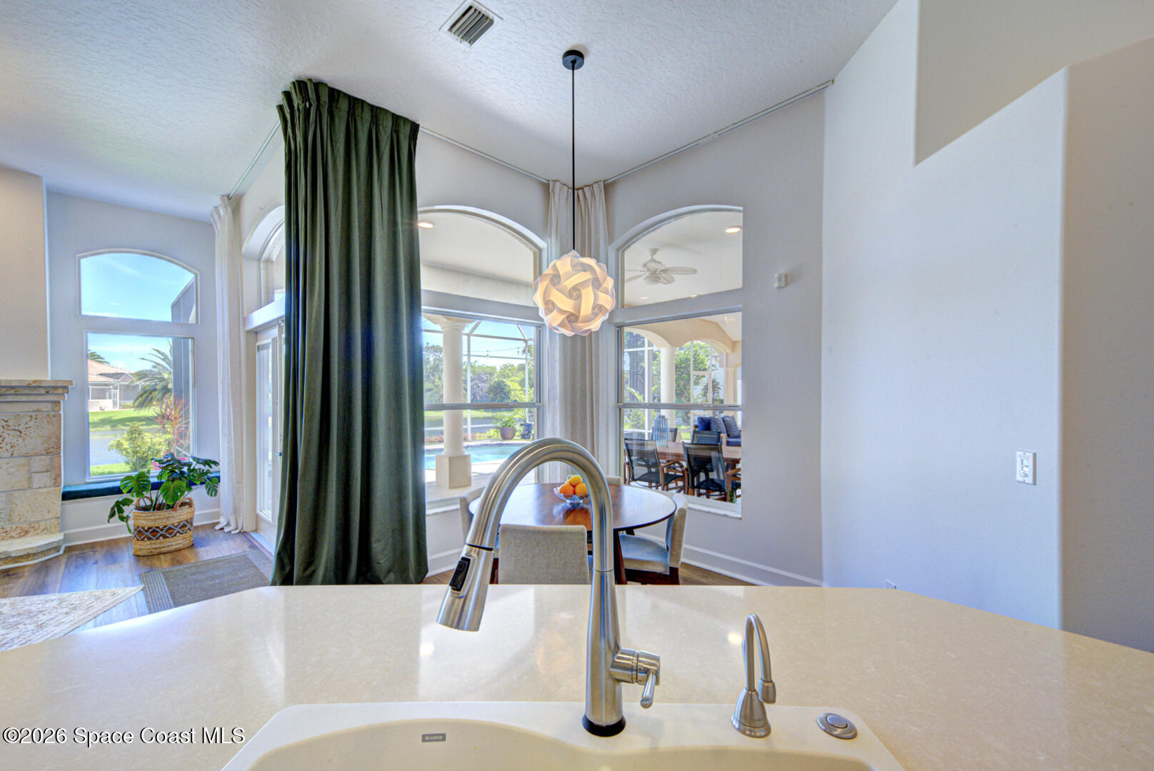 4070 Stoney Point Road Melbourne, FL 32940 - Photo 15 of 78 kitchen view from sink