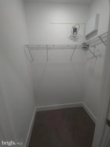 a view of small space with racks on the wall