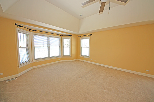 527 Ranch Road Wheaton, IL 60187 - Photo 11 of 25 a view of an empty room with a window