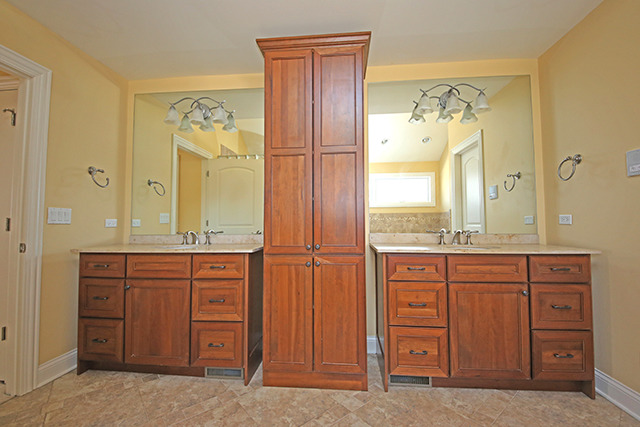 527 Ranch Road Wheaton, IL 60187 - Photo 12 of 25 a bathroom with a granite countertop sink mirror and a