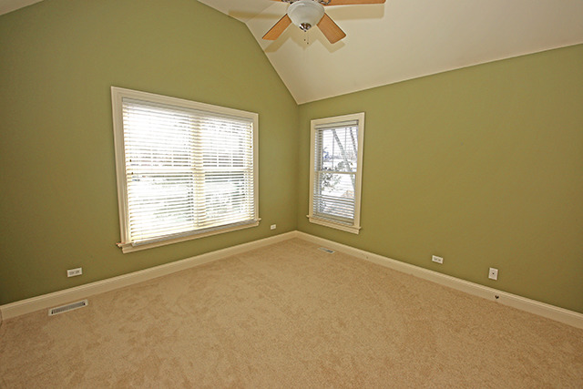 527 Ranch Road Wheaton, IL 60187 - Photo 16 of 25 a view of an empty room with a window