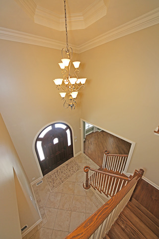 527 Ranch Road Wheaton, IL 60187 - Photo 3 of 25 a view of a chandelier in a room