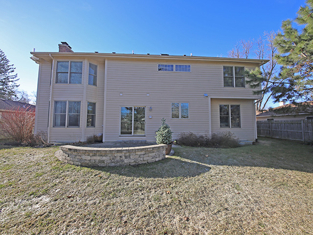 527 Ranch Road Wheaton, IL 60187 - Photo 21 of 25 a front view of a house with a yard