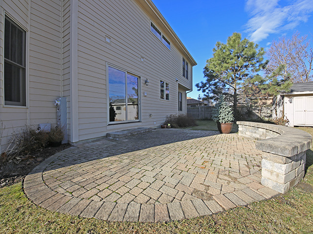 527 Ranch Road Wheaton, IL 60187 - Photo 22 of 25 a view of a backyard of the house