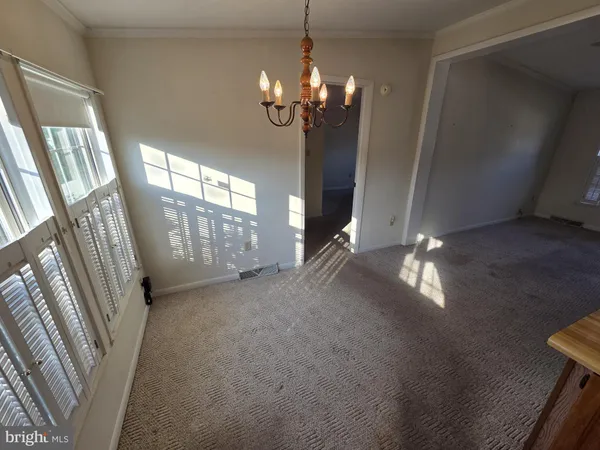 a view of a livingroom with a chandelier