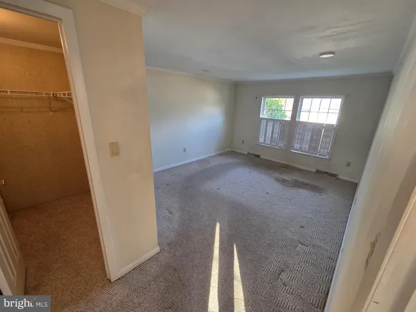 an empty room with windows
