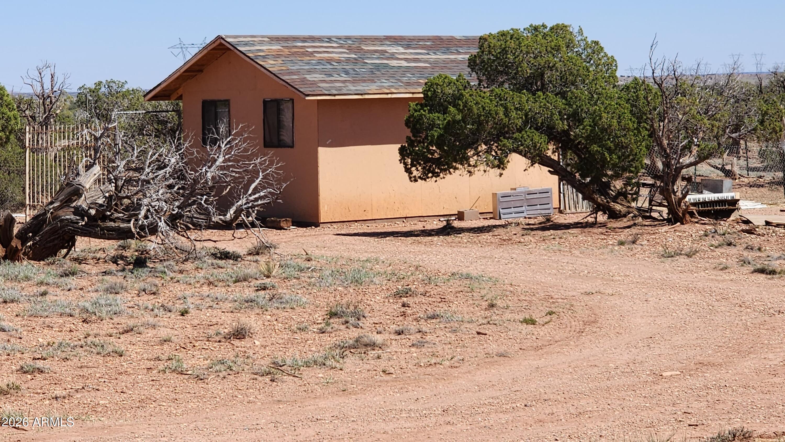 0 Th, Unit 553B Concho, AZ 85924 - Photo 3 of 12 a view of a house with snow on the road