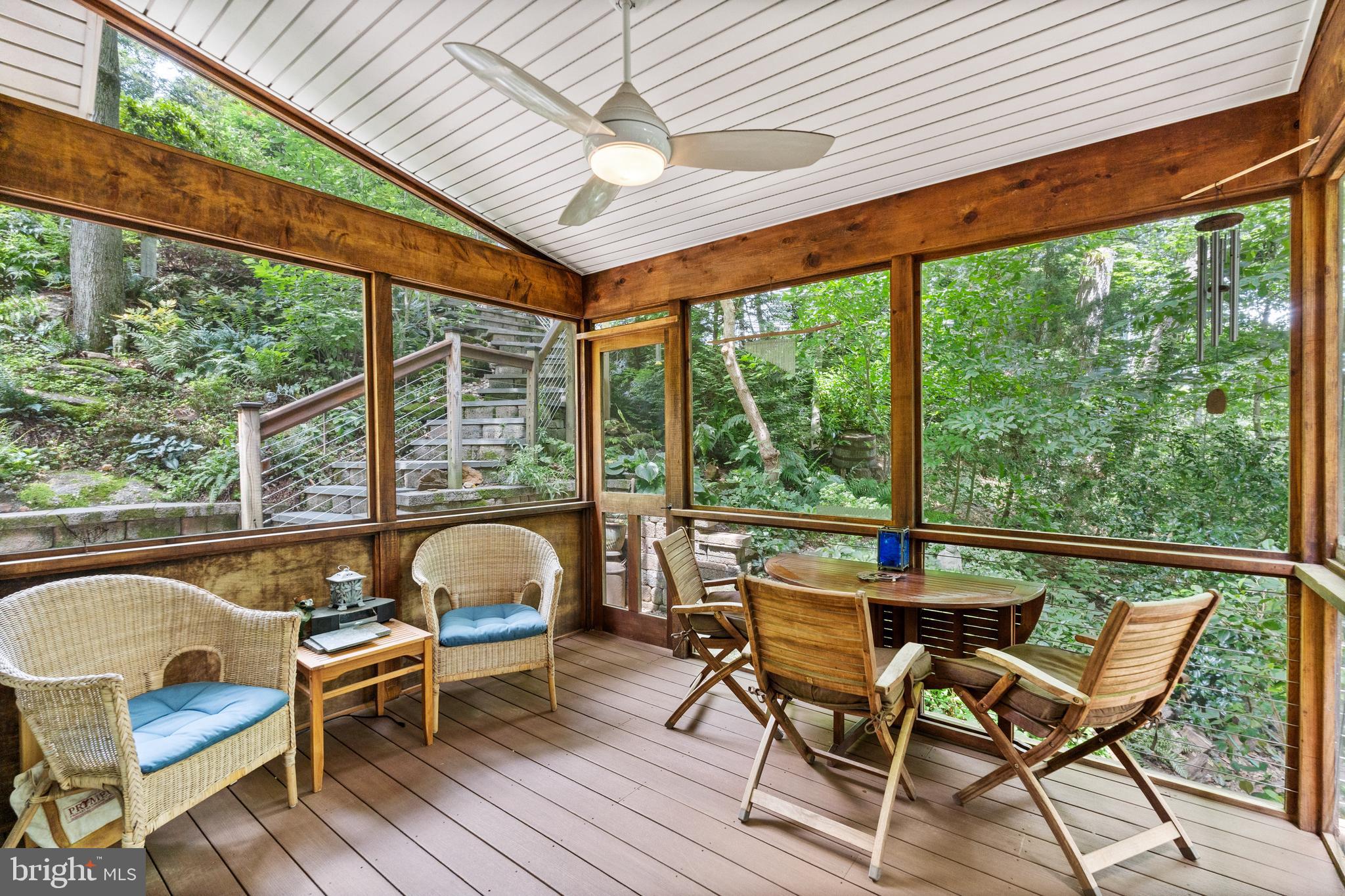357 Overlook Trail Annapolis, MD 21401 - Photo 10 of 45 a view of a patio with a table chairs and a table