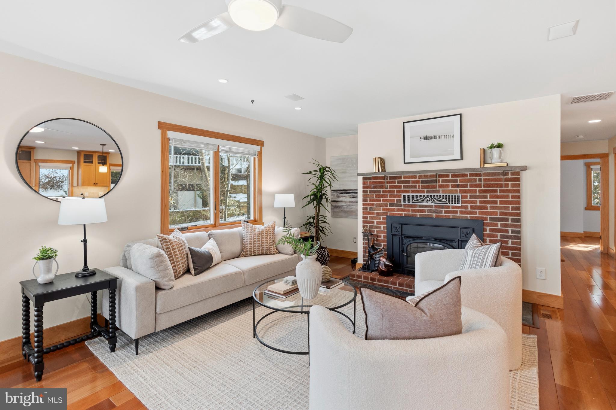 357 Overlook Trail Annapolis, MD 21401 - Photo 14 of 45 a living room with furniture a fireplace and a large window