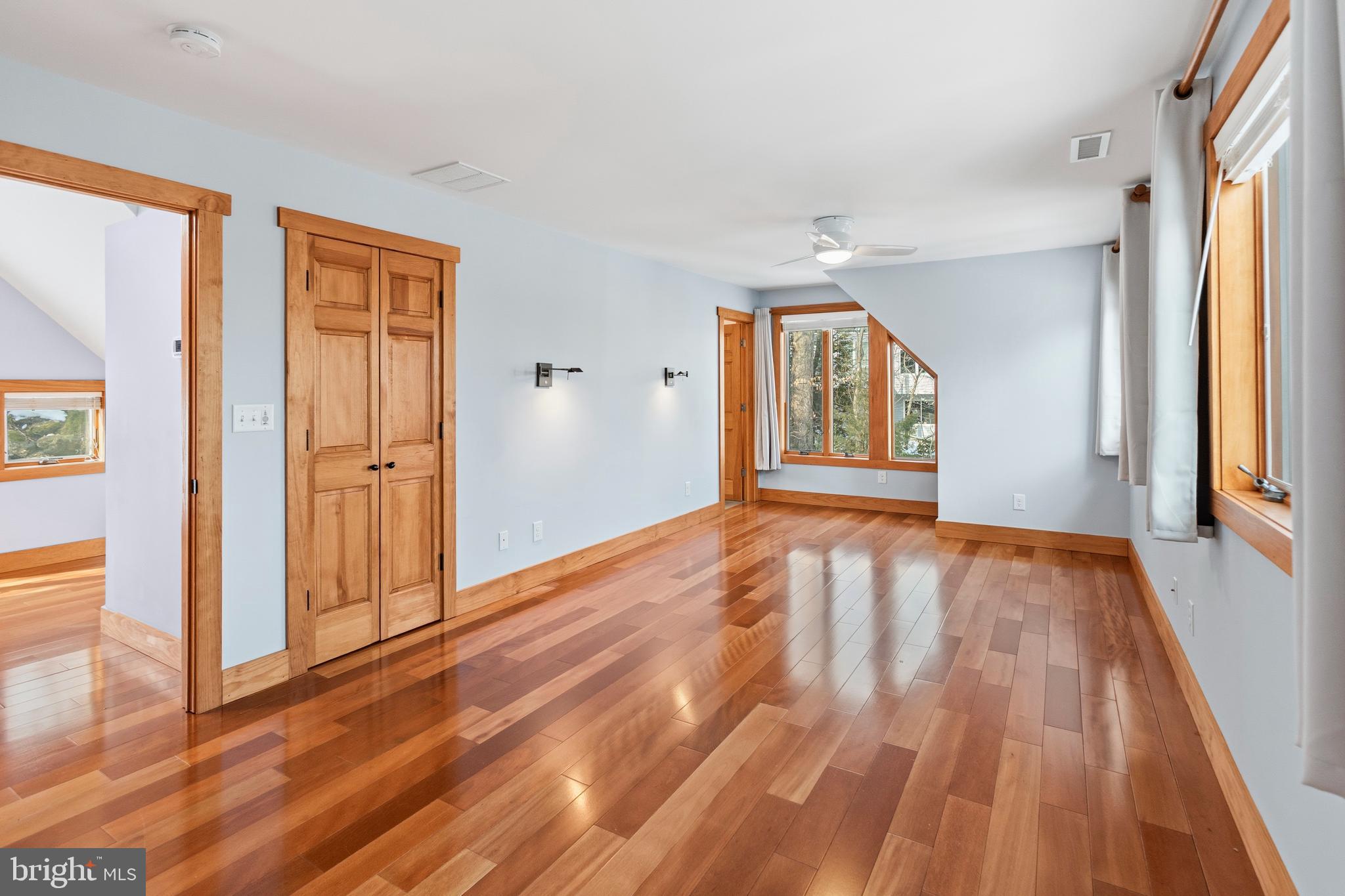 357 Overlook Trail Annapolis, MD 21401 - Photo 22 of 45 an empty room with wooden floor and windows