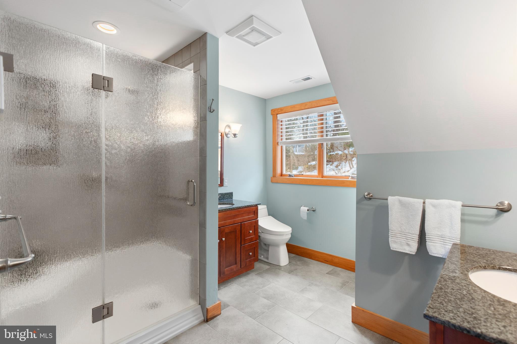 357 Overlook Trail Annapolis, MD 21401 - Photo 23 of 45 a bathroom with a granite countertop sink a toilet and shower