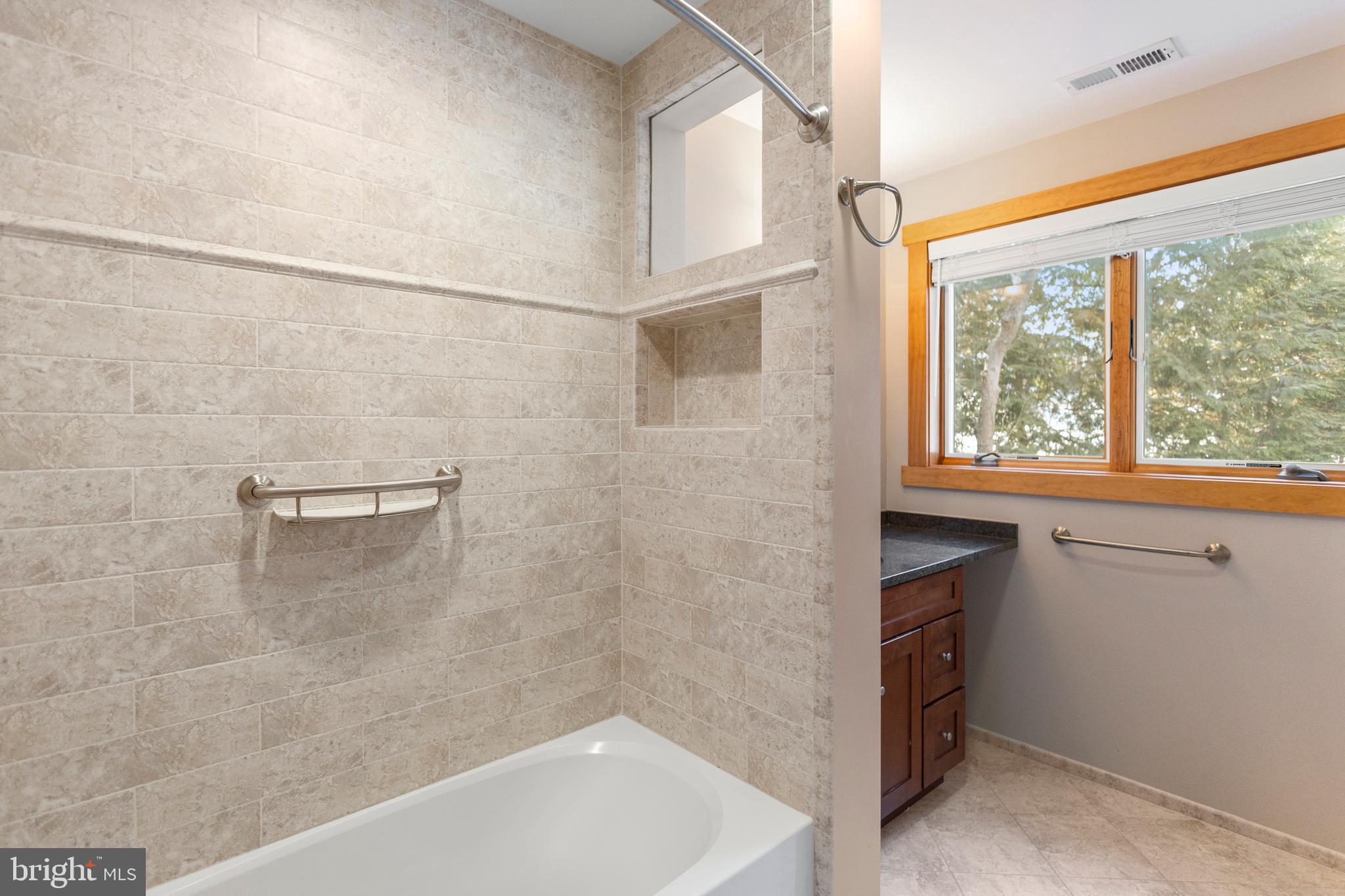 357 Overlook Trail Annapolis, MD 21401 - Photo 26 of 45 a bathroom with a bathtub a shower and a sink