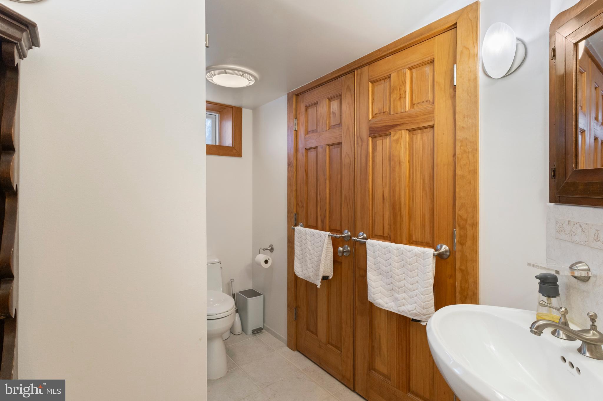 357 Overlook Trail Annapolis, MD 21401 - Photo 33 of 45 a bathroom with a sink a toilet and shower