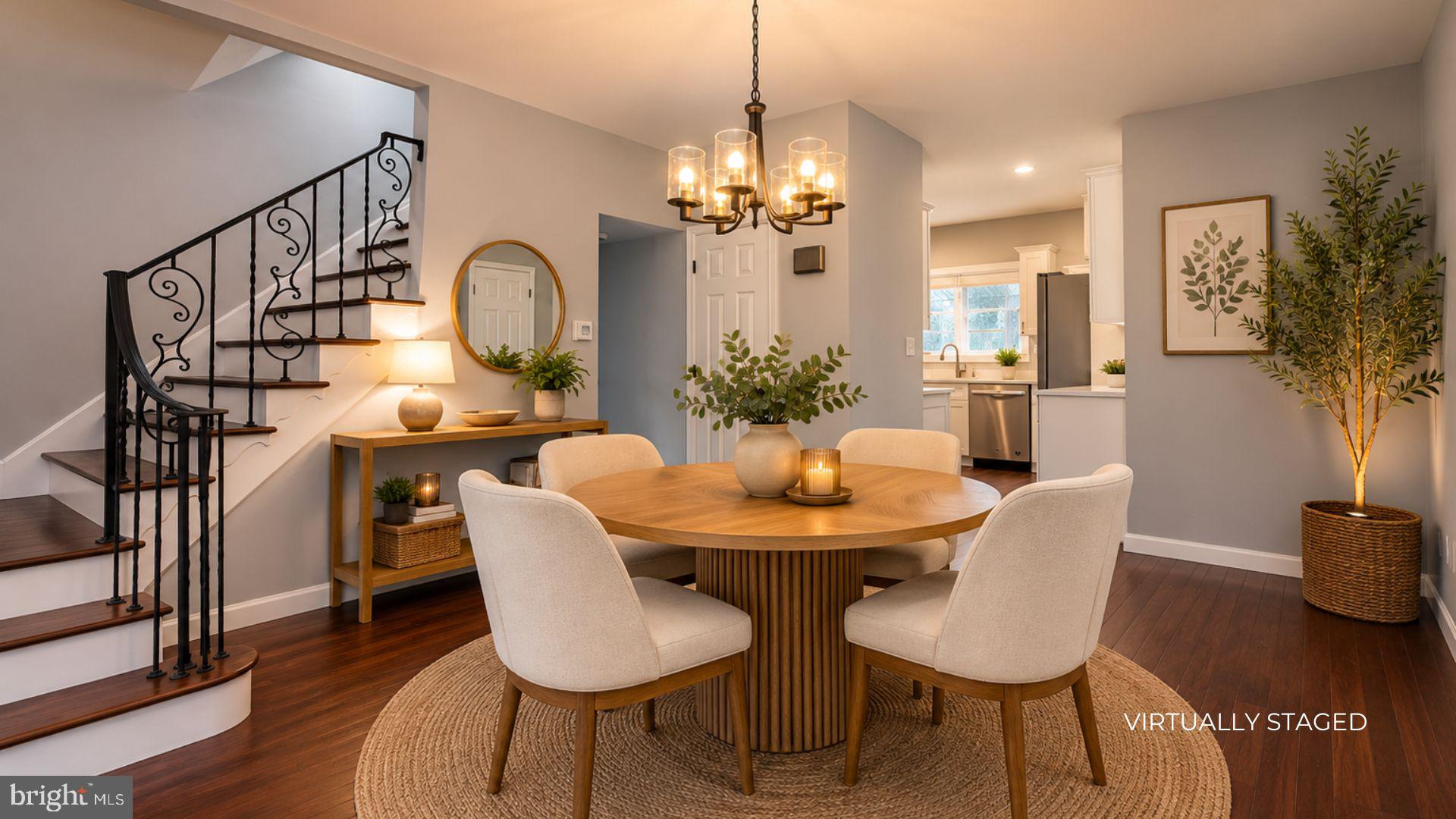 154 Andrew Street Hamilton, NJ 08610 - Photo 7 of 29 a dining room with furniture a chandelier and wooden floor
