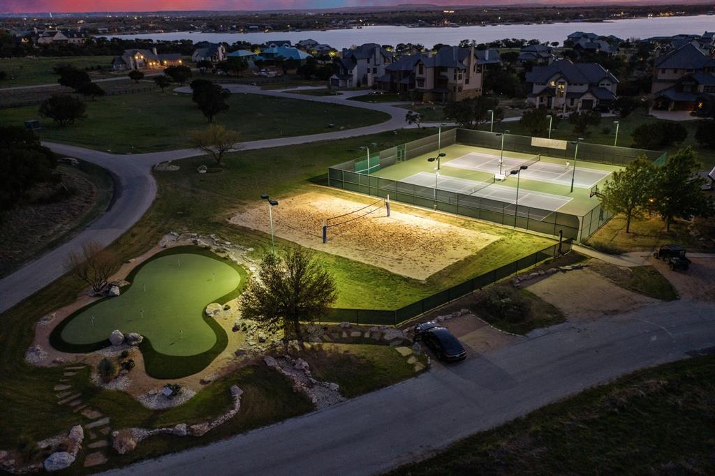 2033 Harbor Way, Unit 302 Graford, TX 76449 - Photo 25 of 28 an aerial view of a house with a swimming pool