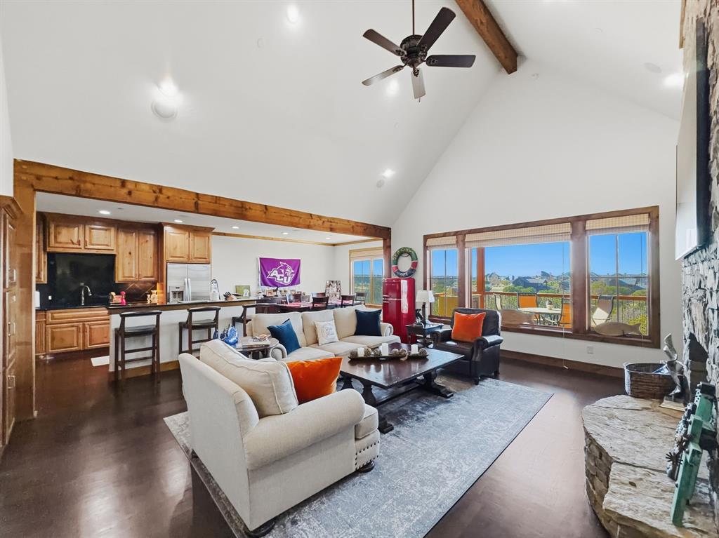 2033 Harbor Way, Unit 302 Graford, TX 76449 - Photo 5 of 28 a living room with furniture and a large window