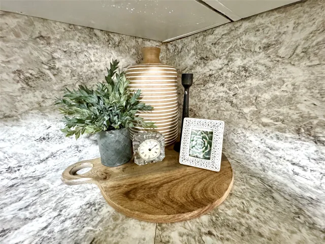 a vase of flowers sitting on a table