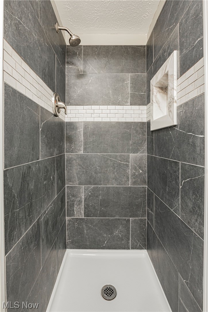 1367 Arcadia Road Kent, OH 44240 - Photo 16 of 20 Bathroom with a tile shower