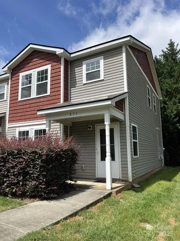 a front view of house with yard