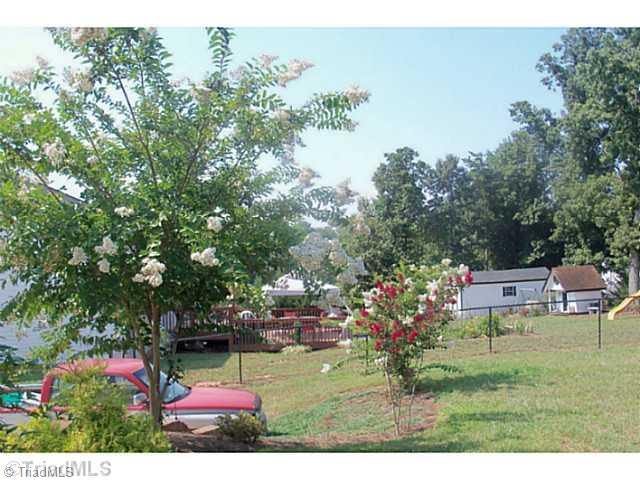 9520 Oakbrook Rural Hall, NC 27045 - Photo 14 of 16 Landscaping. Beautiful landscaping!