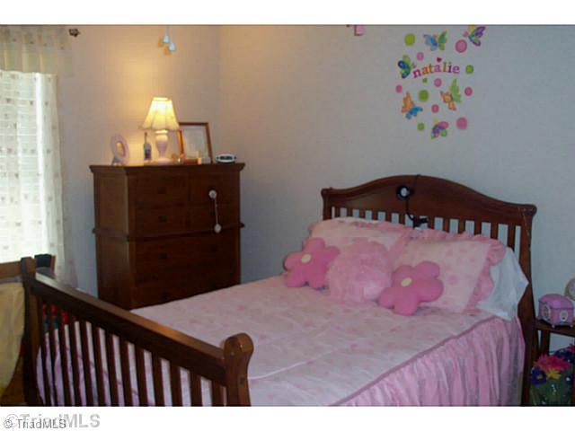 9520 Oakbrook Rural Hall, NC 27045 - Photo 8 of 16 2nd Bedroom. Spacious guest bedrooms.