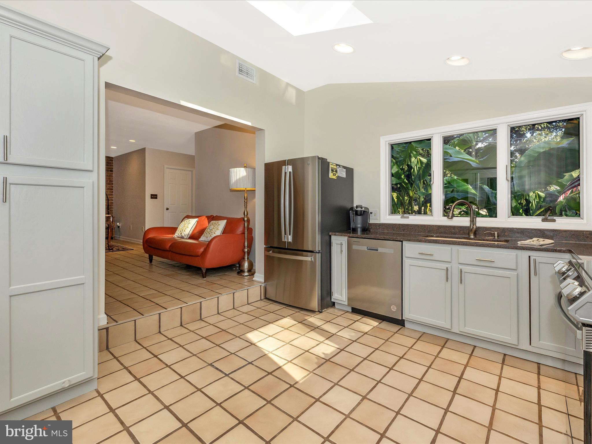 203 Sunset Avenue Mount Airy, MD 21771 - Photo 14 of 57 Step Down from Great Room to Kitchen