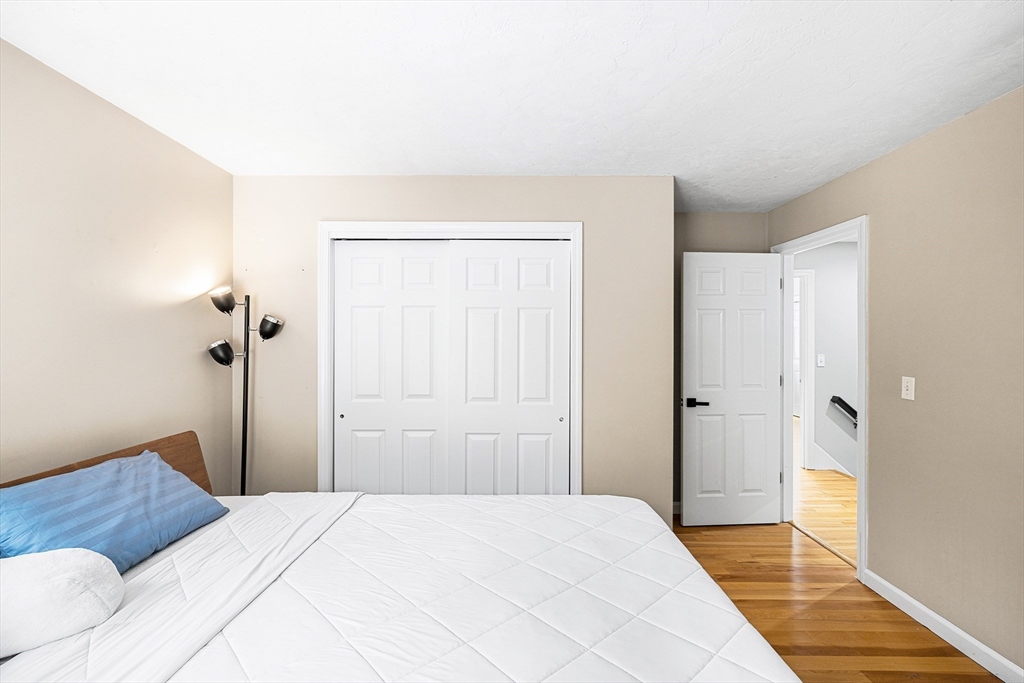 13 Jonathans Way Upton, MA 01568 - Photo 24 of 36 a bedroom with a bed and a closet