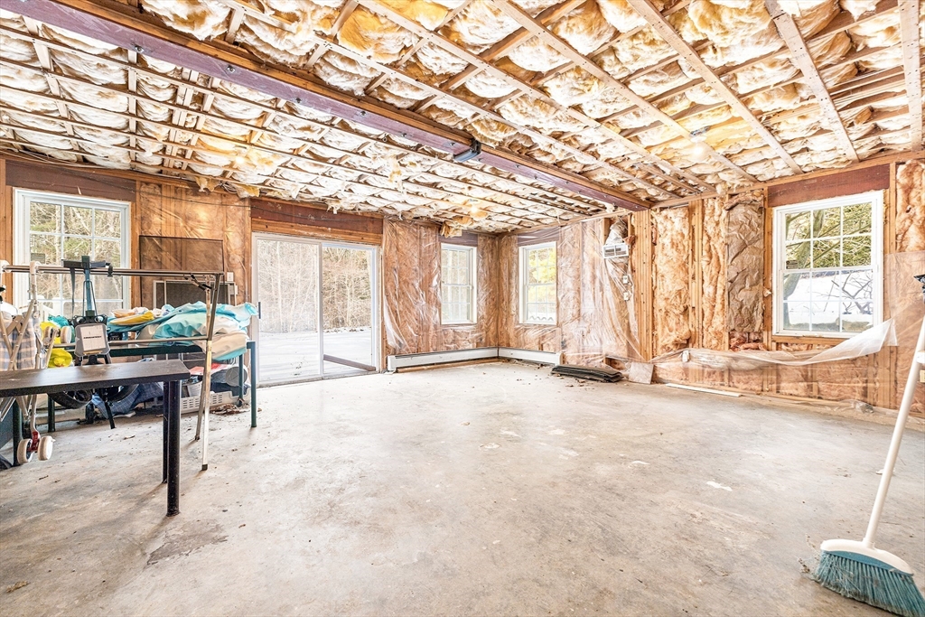 13 Jonathans Way Upton, MA 01568 - Photo 30 of 36 a view of a large room with table and chairs