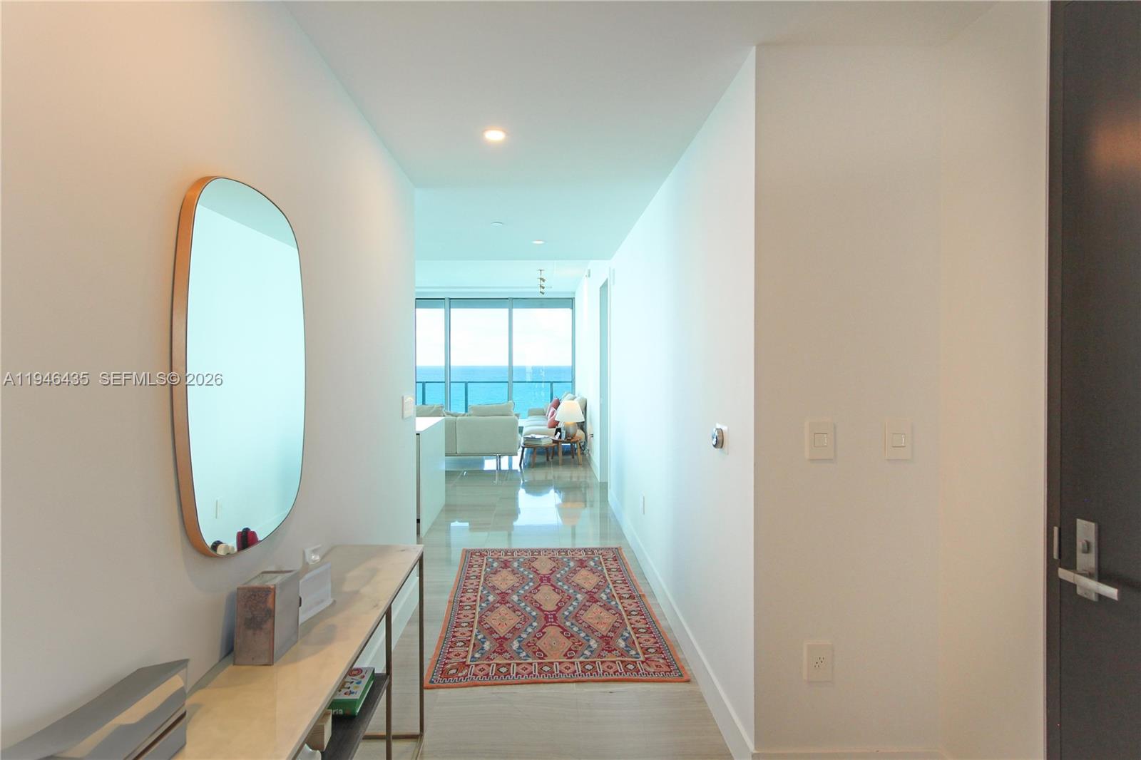 6901 Collins Avenue, Unit 901 Miami Beach, FL 33141 - Photo 12 of 21 a view of a livingroom with furniture
