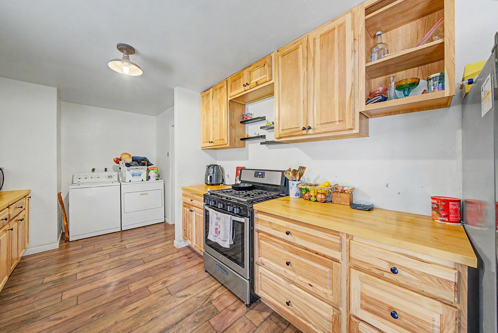 58374 Gill Ranch Road Cromberg, CA 96103 - Photo 24 of 44 a kitchen with stainless steel appliances granite countertop a stove a sink and a refrigerator