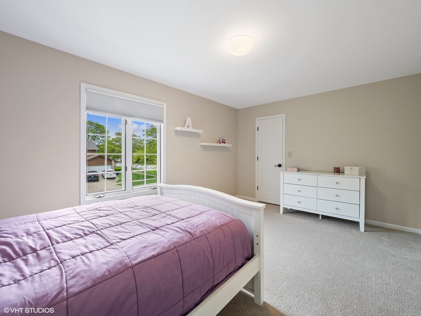 1002 Elmdale Road Glenview, IL 60025 - Photo 32 of 51 a bedroom with a bed and a window