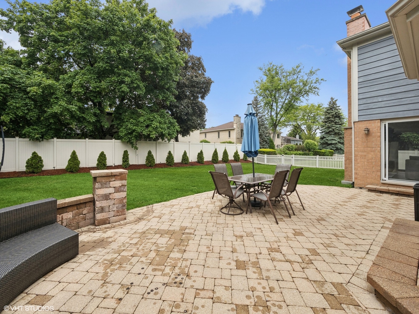 1002 Elmdale Road Glenview, IL 60025 - Photo 47 of 51 a view of a bench in the garden